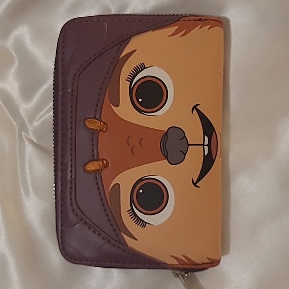 Loungefly Handbags - Loungefly Brown and Tan Zipper Wallet With Silver Hardware